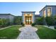 Charming front entrance with stone pathway, manicured lawn, and modern architectural details at 24066 N 90Th Way, Scottsdale, AZ 85255