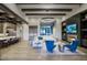 Open floor plan showing the living room and kitchen with modern finishes and ample seating at 24066 N 90Th Way, Scottsdale, AZ 85255