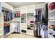 Spacious closet featuring custom shelves, ample racks, and well-organized storage at 24066 N 90Th Way, Scottsdale, AZ 85255