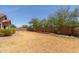 Spacious backyard offering privacy and potential for entertaining and relaxation at 25667 W Primrose Ln, Buckeye, AZ 85326