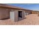 Features a storage shed on rock landscaping with air conditioning units at 25667 W Primrose Ln, Buckeye, AZ 85326
