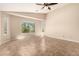 Large bedroom offering lots of natural light with an expansive window view at 25667 W Primrose Ln, Buckeye, AZ 85326