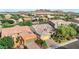 Aerial image shows a suburban home with tile roof, desert landscaping, and mountain views at 31107 N 27Th Ave, Phoenix, AZ 85085