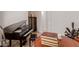 This bonus room has a piano, wine storage and a table for games at 31107 N 27Th Ave, Phoenix, AZ 85085