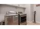 Laundry area with modern washer and dryer, and space saving vaccuum at 31107 N 27Th Ave, Phoenix, AZ 85085