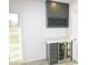 Stylish bar area with sleek cabinets, marble countertops, and a modern wine fridge at 3310 W Sweetwater Ave, Phoenix, AZ 85029
