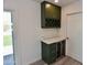 Close-up of a modern bar area, complete with a wine cooler, rack, and countertop at 3310 W Sweetwater Ave, Phoenix, AZ 85029