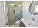 Nicely remodeled bathroom with glass enclosed shower, brushed nickel fixtures and a granite vanity at 3310 W Sweetwater Ave, Phoenix, AZ 85029