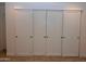 Neutral closet with white sliding doors at 3310 W Sweetwater Ave, Phoenix, AZ 85029