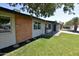 Charming single story home with a green lawn and updated front facade at 3310 W Sweetwater Ave, Phoenix, AZ 85029