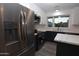 Bright kitchen featuring modern stainless steel appliances and ample counter space at 3310 W Sweetwater Ave, Phoenix, AZ 85029