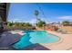 Backyard featuring a pool, lounge chairs, decorative string lights, and shaded pergola at 3408 W Carol Ave, Phoenix, AZ 85051
