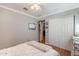 A serene bedroom featuring a closet and ample natural light at 3408 W Carol Ave, Phoenix, AZ 85051
