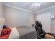 Neutral bedroom with a comfortable bed and chair; well-lit and inviting at 3408 W Carol Ave, Phoenix, AZ 85051