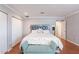 Light-filled main bedroom featuring a comfortable bed, ensuite, and closet space at 3408 W Carol Ave, Phoenix, AZ 85051