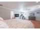 The main bedroom features a large bed, dresser, and relaxing atmosphere at 3408 W Carol Ave, Phoenix, AZ 85051