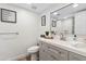 Nicely renovated bathroom featuring a modern vanity and updated fixtures at 3615 E Charter Oak Rd, Phoenix, AZ 85032