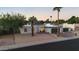 Single-story home with desert landscaping and mountain views in the background and a brick driveway at 3615 E Charter Oak Rd, Phoenix, AZ 85032