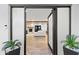 View of the open-concept living room and fireplace through front door at 3615 E Charter Oak Rd, Phoenix, AZ 85032
