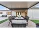 Covered patio dining area for outdoor entertaining and relaxation at 3615 E Charter Oak Rd, Phoenix, AZ 85032
