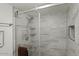 Stylish bathroom with glass-enclosed shower and tiled walls at 3825 E Camelback Rd # 117, Phoenix, AZ 85018