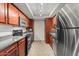 Modern kitchen featuring stainless steel appliances, and sleek countertops at 3825 E Camelback Rd # 117, Phoenix, AZ 85018