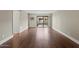 Open concept living room with hardwood floors and lots of natural light at 3825 E Camelback Rd # 117, Phoenix, AZ 85018
