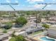 Suburban home with a sparkling pool, lush backyard, and a view of the nearby San Tan Mountain Park and Downtown Chandler at 400 N Jay N St, Chandler, AZ 85225