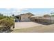 Exterior view of the rear of the house showing the covered parking area at 400 N Jay N St, Chandler, AZ 85225