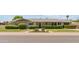 Charming single story home featuring well-maintained landscaping and mature shrubbery at 400 N Jay N St, Chandler, AZ 85225
