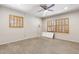 Bright living room with vinyl floors and wooden-blind windows includes floor access at 400 N Jay N St, Chandler, AZ 85225