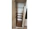 Pantry featuring an organized storage solution with shelves and a visually appealing geometric floor at 4008 W El Caminito Dr, Phoenix, AZ 85051
