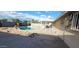 Backyard oasis with a refreshing pool and covered patio area, perfect for outdoor entertaining at 4008 W El Caminito Dr, Phoenix, AZ 85051