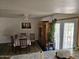 Cozy dining area featuring a wooden dining set and plenty of natural light at 4614 N 19 Ave, Phoenix, AZ 85015
