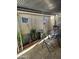 Cozy covered patio space featuring a garden area and comfortable seating, perfect for enjoying the outdoors at 4614 N 19 Ave, Phoenix, AZ 85015