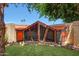 Backyard with lush grass and mature trees at 4808 W Shaw Butte Dr, Glendale, AZ 85304