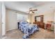 Bedroom with carpet, ceiling fan, and window at 4808 W Shaw Butte Dr, Glendale, AZ 85304