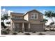 Charming two-story home with a covered front porch and an attached two-car garage at 5529 W Mauna Loa Ln, Glendale, AZ 85306