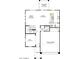 Open-concept floor plan featuring a spacious great room, dining area, and kitchen with a covered patio at 5529 W Mauna Loa Ln, Glendale, AZ 85306