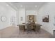 Elegant dining room with ample natural light, perfect for Gathering gatherings at 5749 E Sanford St, Mesa, AZ 85215