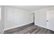A bright and neutral-toned bedroom with hard surface floors at 5942 N 83Rd St, Scottsdale, AZ 85250