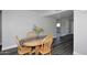 Cozy dining area featuring a wooden table set and modern flooring, perfect for Gathering meals at 5942 N 83Rd St, Scottsdale, AZ 85250