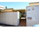 Exterior gate view to front entry with address, leading to covered walkway at 5942 N 83Rd St, Scottsdale, AZ 85250