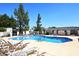 Sparkling community pool with lounge chairs and lush landscaping provides a relaxing outdoor oasis at 5942 N 83Rd St, Scottsdale, AZ 85250