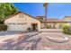 Charming single Gathering home with desert landscaping and a two car garage at 6122 E Saddleback St, Mesa, AZ 85215