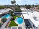A refreshing pool is surrounded by lush landscaping and modern patio furniture, perfect for outdoor living at 6539 E Sharon Dr, Scottsdale, AZ 85254