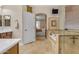 Bathroom showcasing a soaking tub, walk-in shower, and convenient access to the Primary bedroom at 6870 S Justin Way, Chandler, AZ 85249