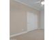 Neutral bedroom with a ceiling fan and a closet at 6870 S Justin Way, Chandler, AZ 85249