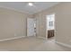 Bedroom with en-suite bathroom featuring carpet, neutral paint and bathroom view at 6870 S Justin Way, Chandler, AZ 85249