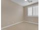Neutral bedroom with carpet, light tan walls, a ceiling fan, and window with white shutters at 6870 S Justin Way, Chandler, AZ 85249